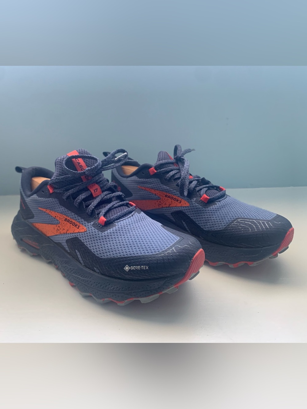 Brooks Cascadia Trail Running Shoes in Blue with Orange Accents